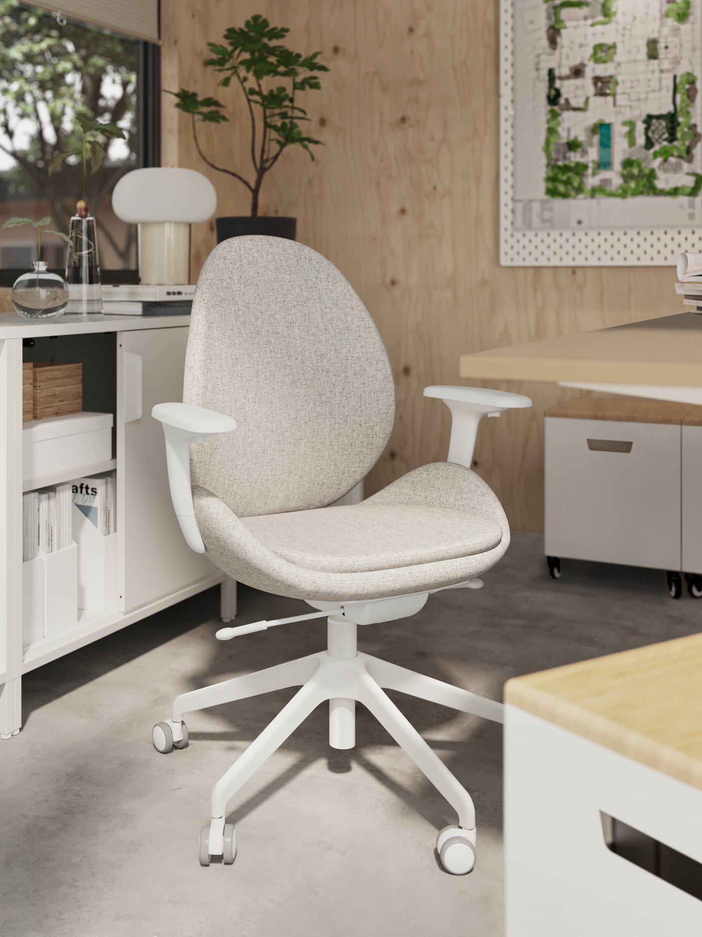 A Gunnared beige HATTEFJÄLL office chair with armrests in the home office