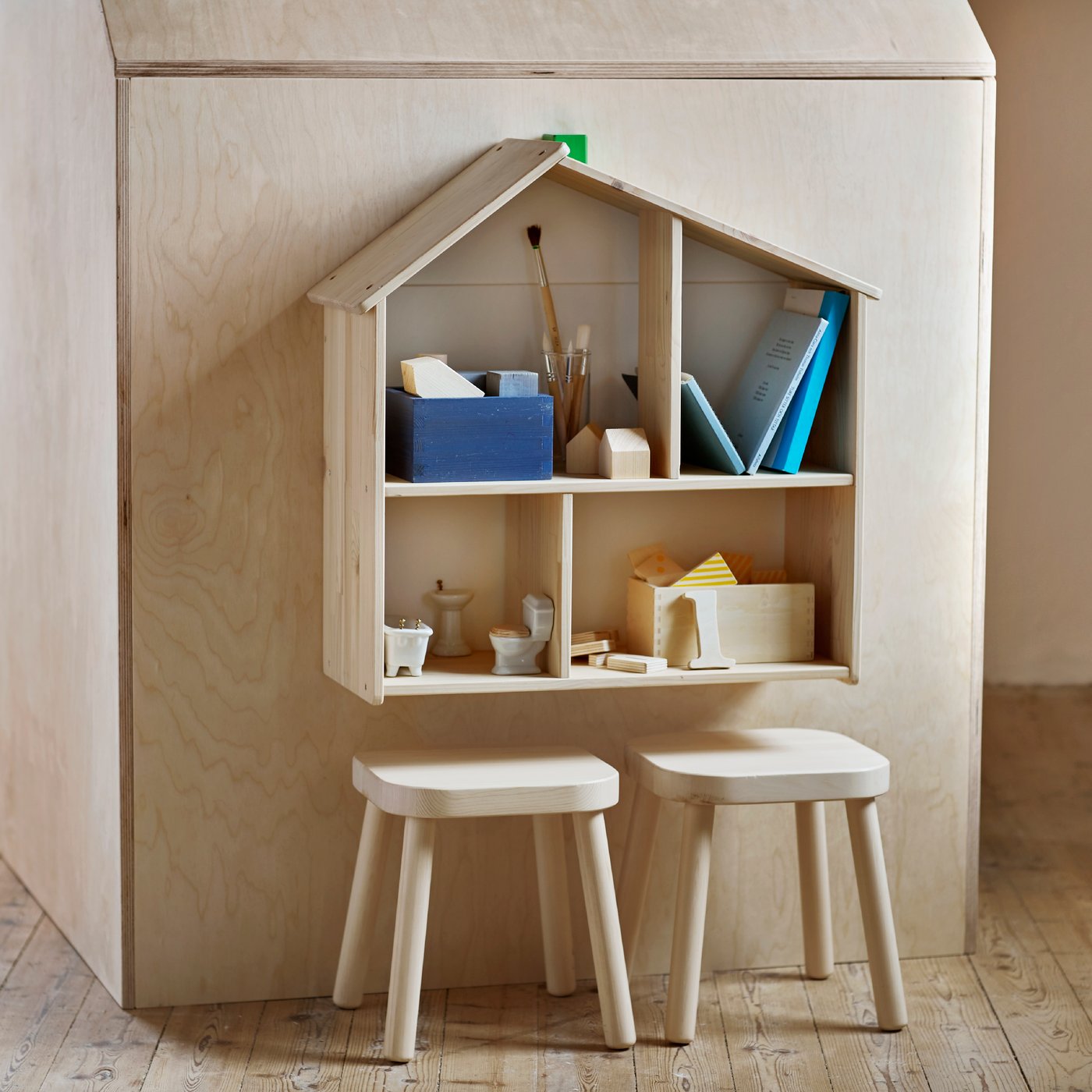 A pine FLISAT children's stool in the childrens room