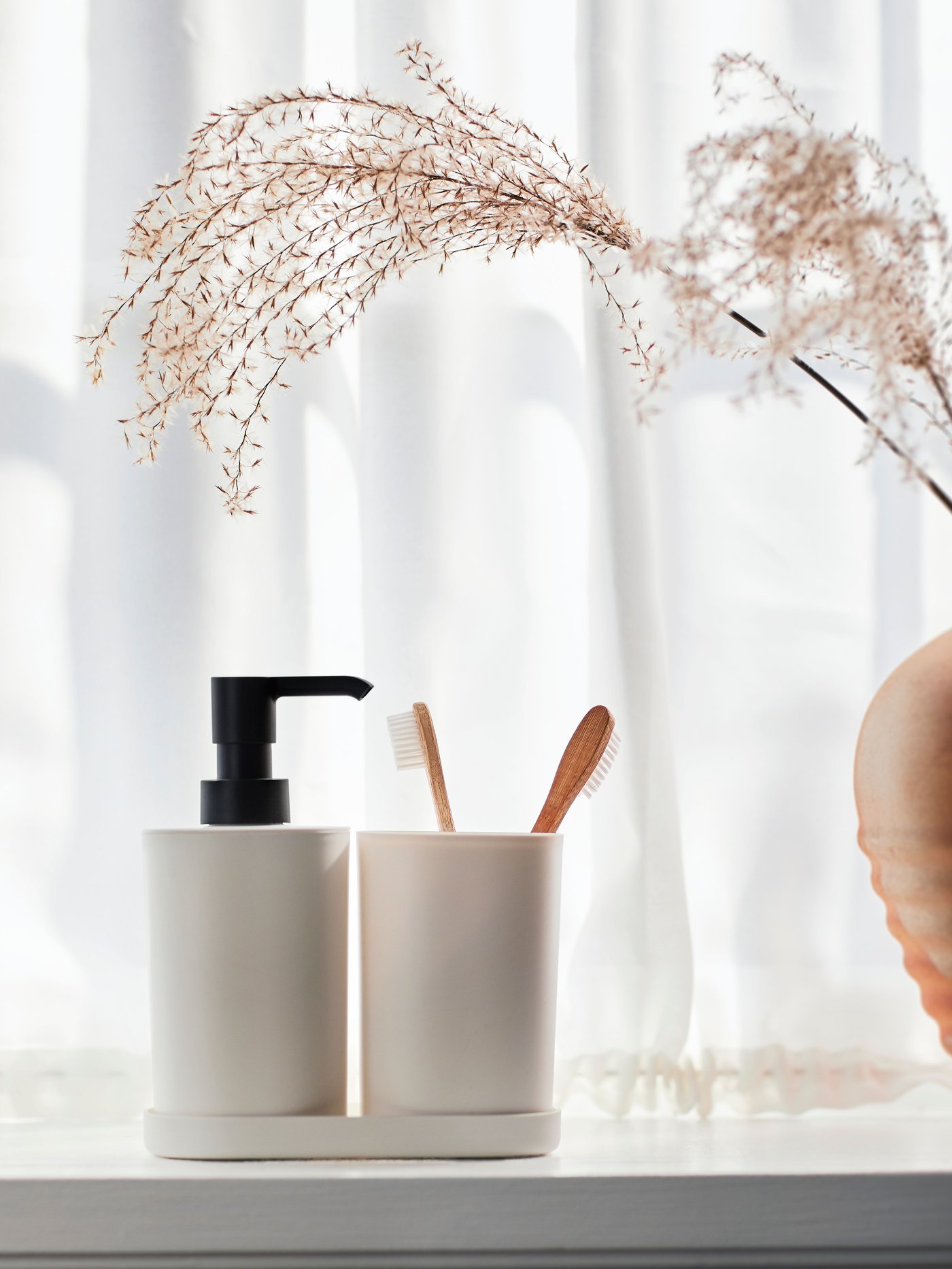 A white STORAVAN 3-piece bathroom set in the bathroom