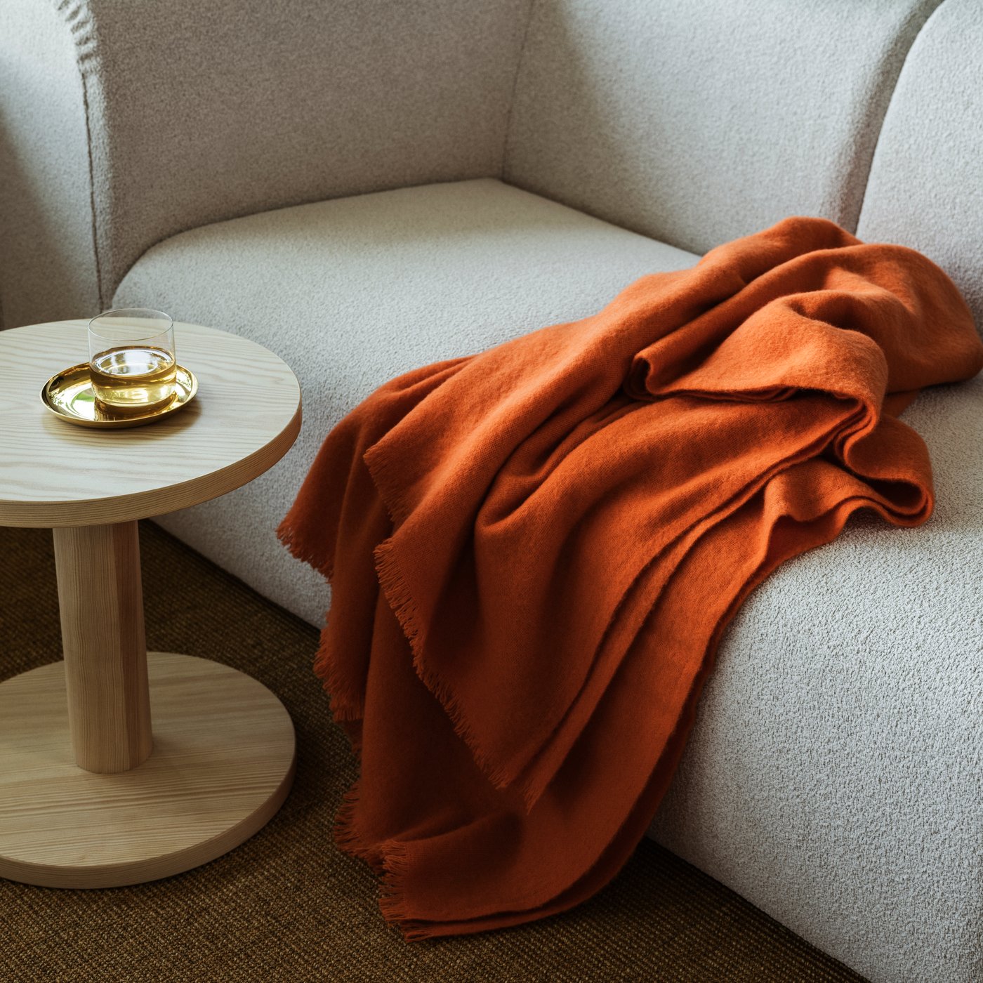 A brass-colour STOCKHOLM 2025 bowl and dish in the living room