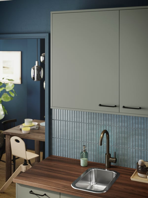 A pewter effect DELSJÖN kitchen mixer tap