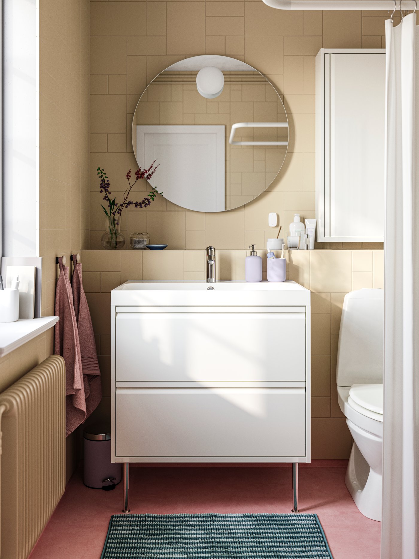 A white VIKARN shower curtain rod in the bathroom