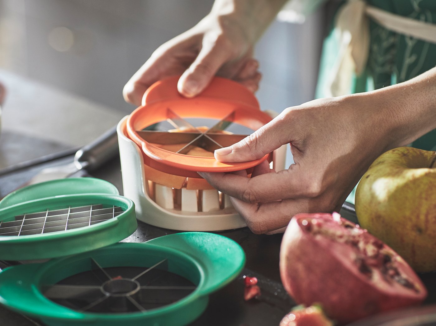 A mixed colours UPPFYLLD fruit cutter