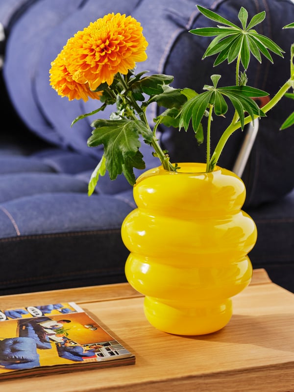 An yellow KÄLLARHALS vase.