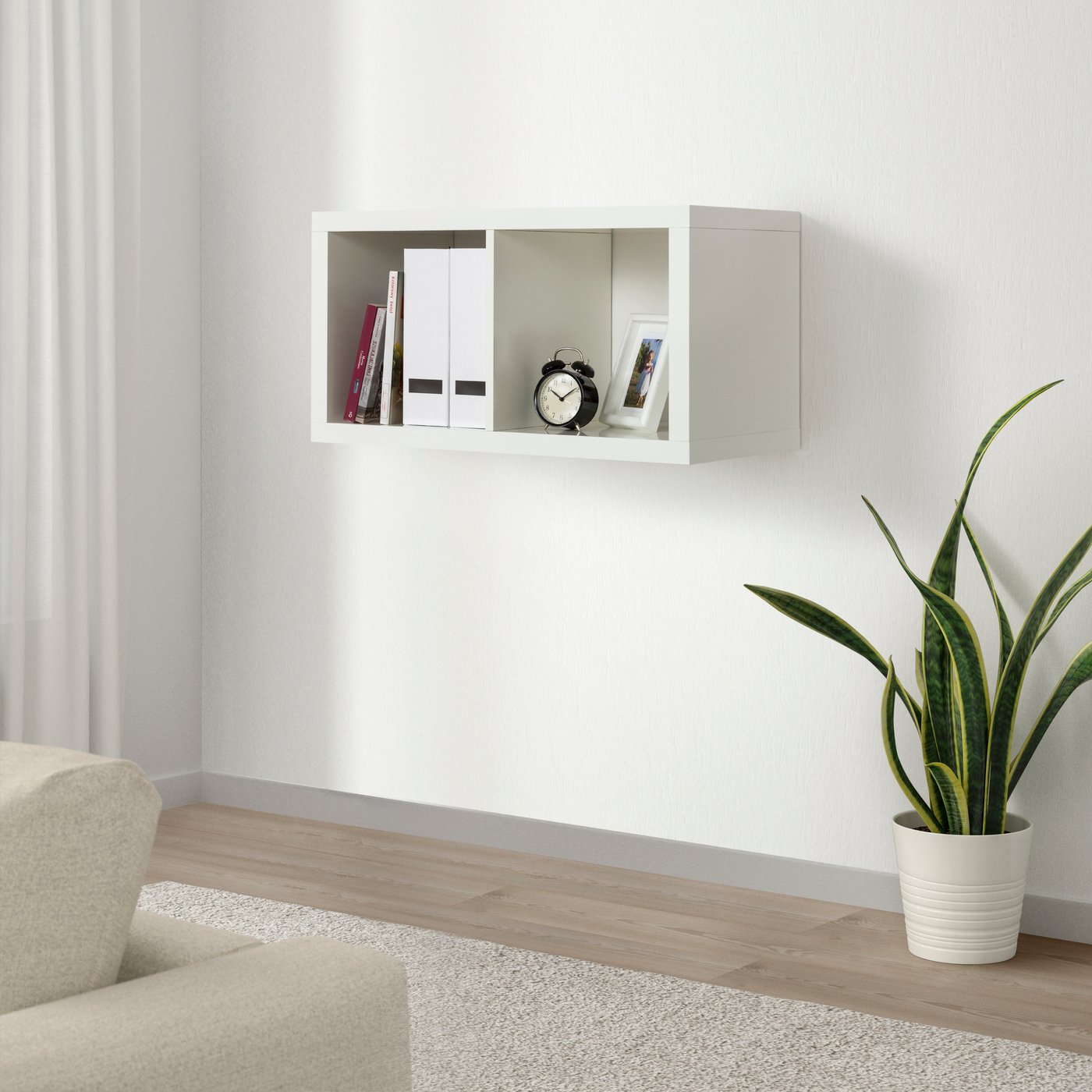 A white KALLAX shelving unit