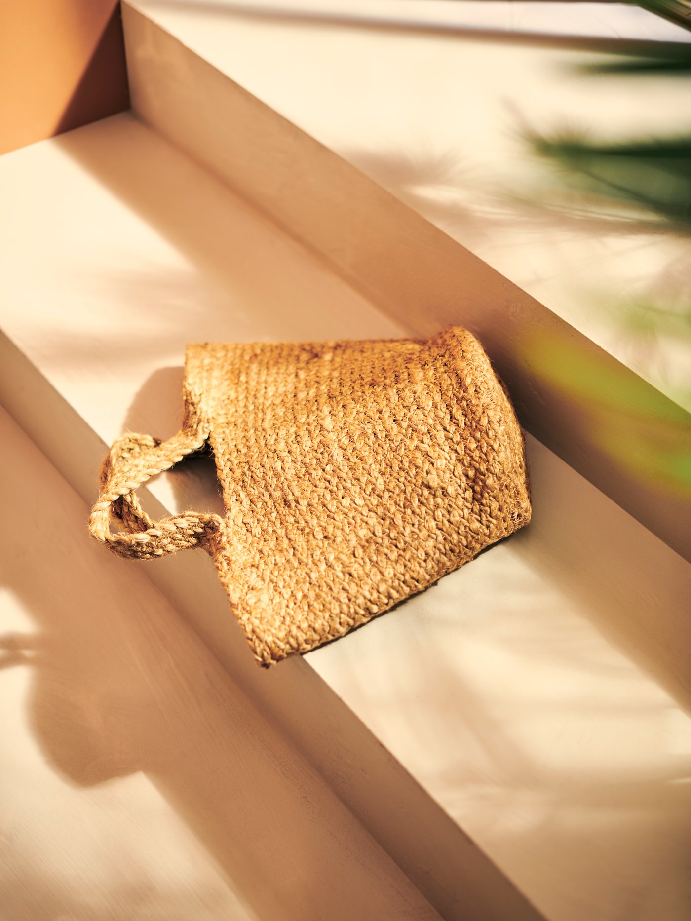 A jute TOLKNING hanging basket