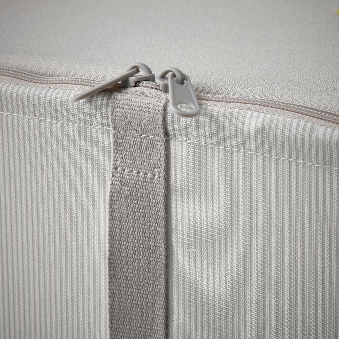 A fabric striped/white/grey HEMMAFIXARE storage case