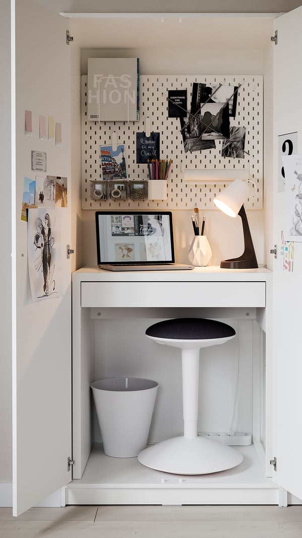 A white/Vissle dark blue NILSERIK standing support in the home office