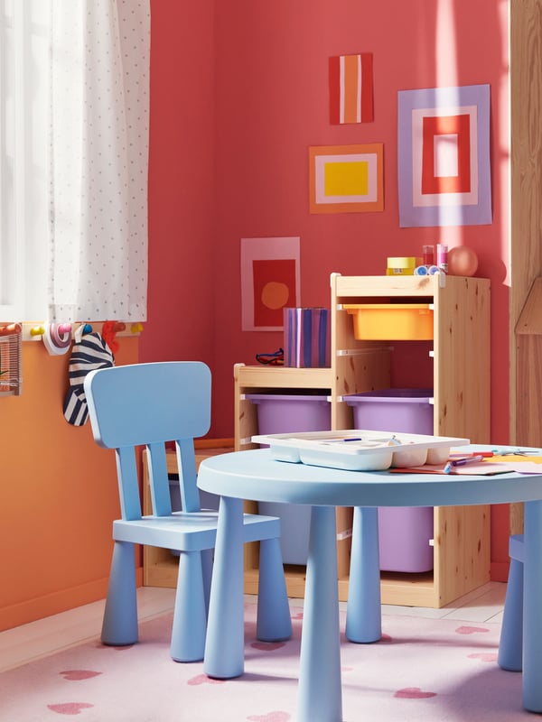 A light white stained pine TROFAST frame in the childrens room