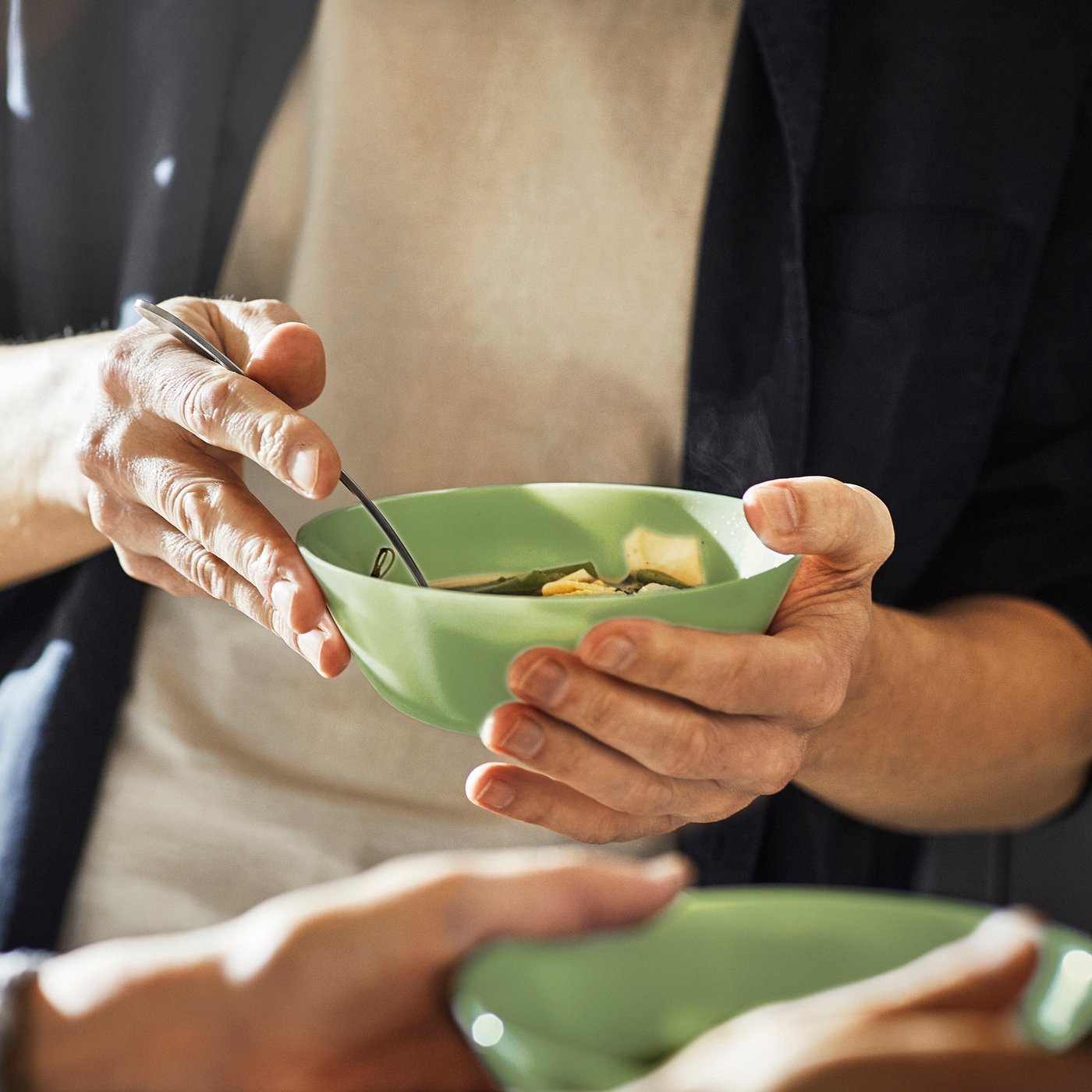 A light green OFTAST bowl
