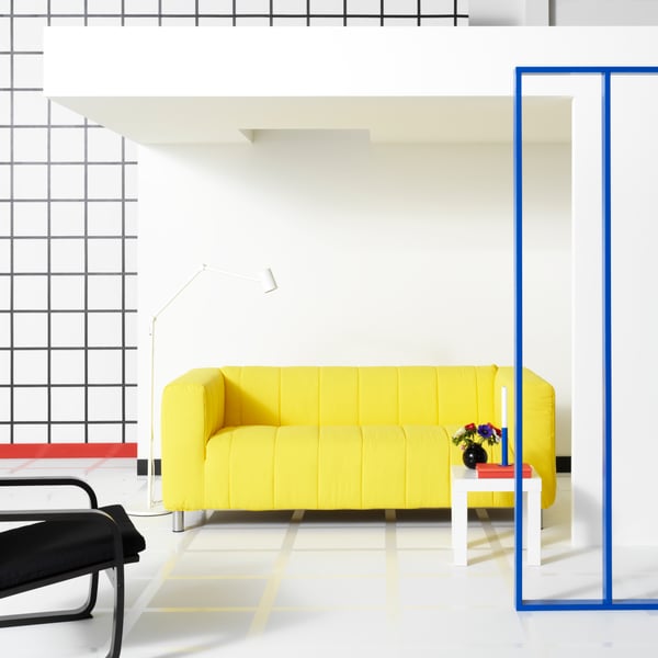 A Långban bright yellow KLIPPAN cover for 2-seat sofa