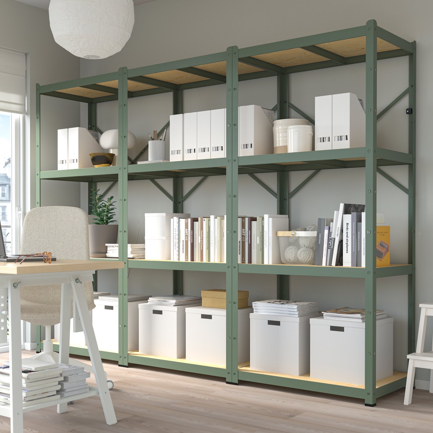 A grey-green/pine plywood BROR shelving unit