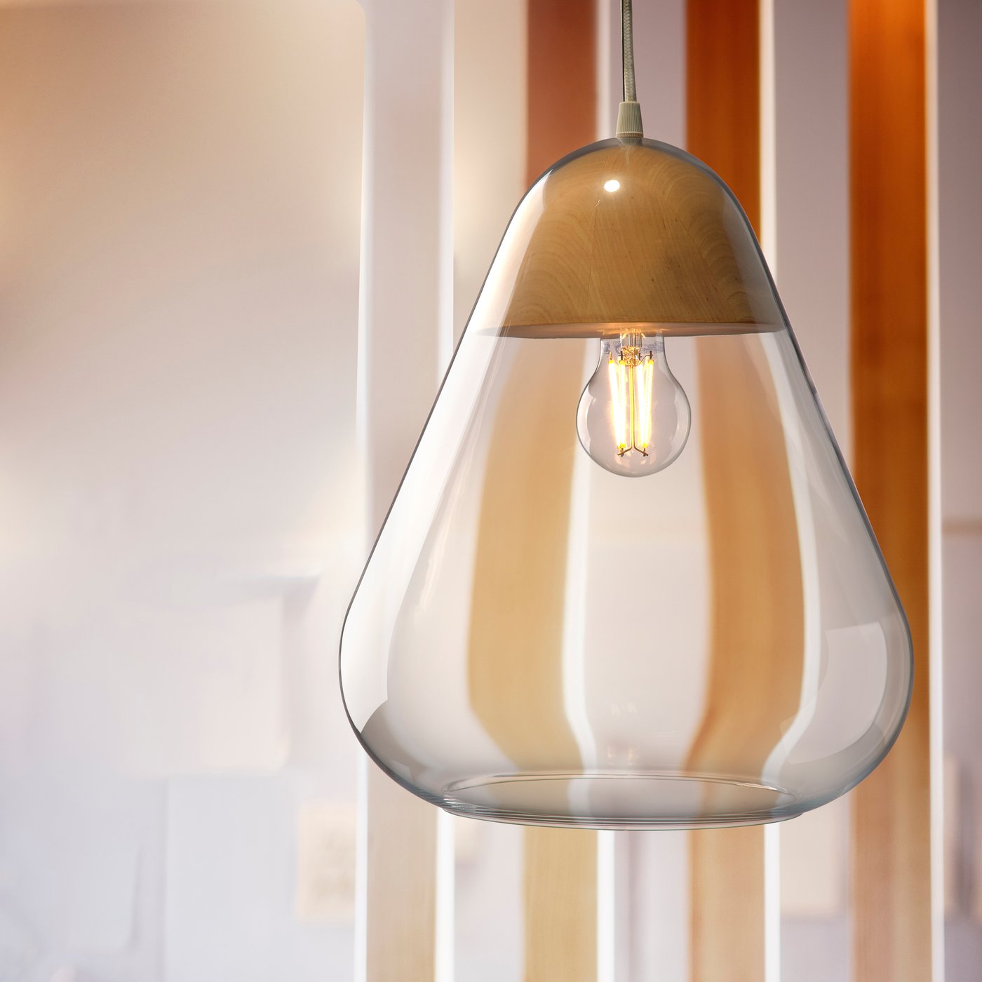 A glass/solid birch AKTERGAST pendant lamp