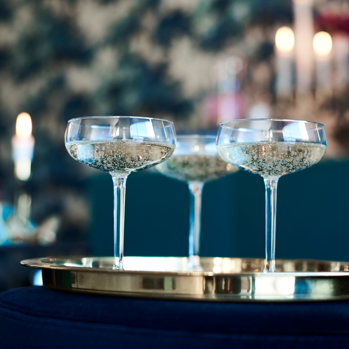 A clear glass STORHET champagne coupe