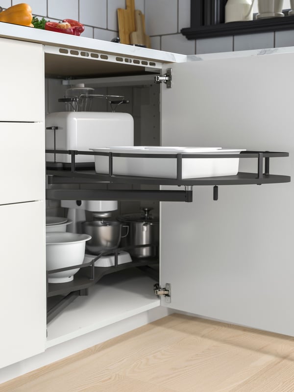 A grey UTRUSTA crnr base cabinet pull-out fitting
