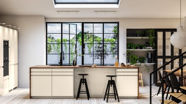 An IKEA VOXTORP high-gloss beige kitchen with an island