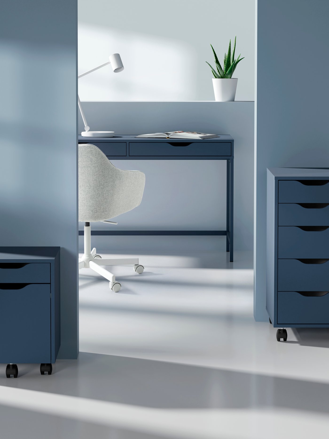 A black-blue ALEX drawer unit on castors