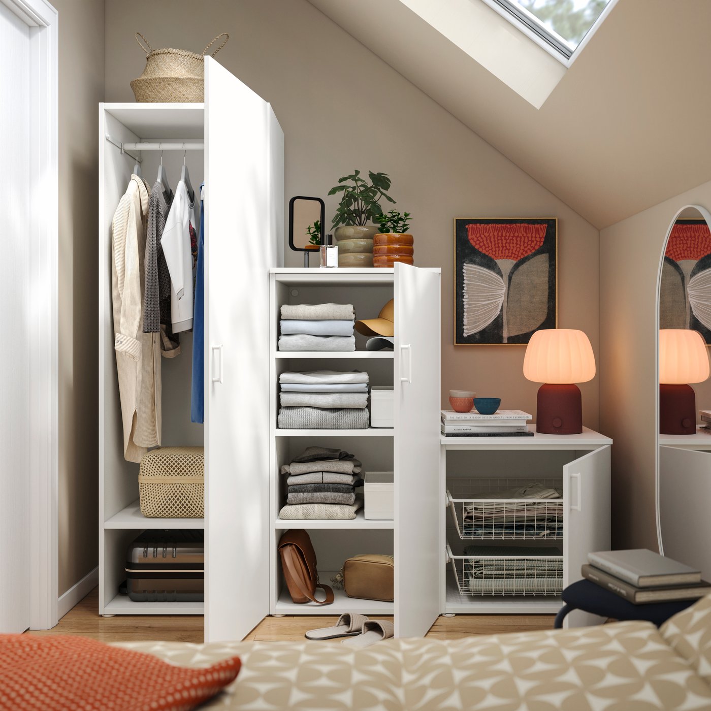 PLATSA wardrobe combination under a slopped ceiling.
