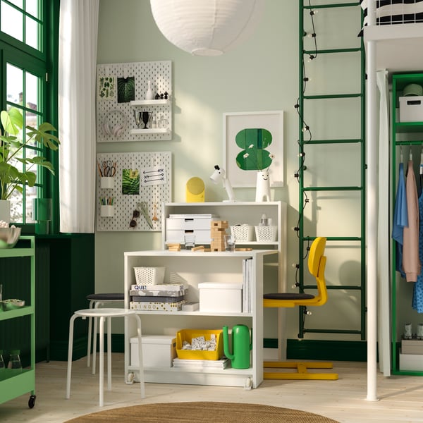 A white BILLY bookcase with foldable table