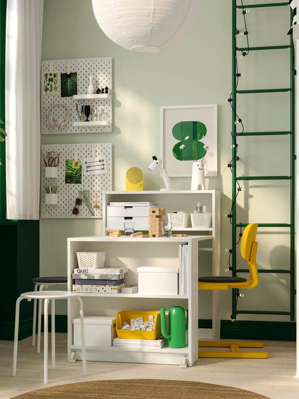 A white BILLY bookcase with foldable table