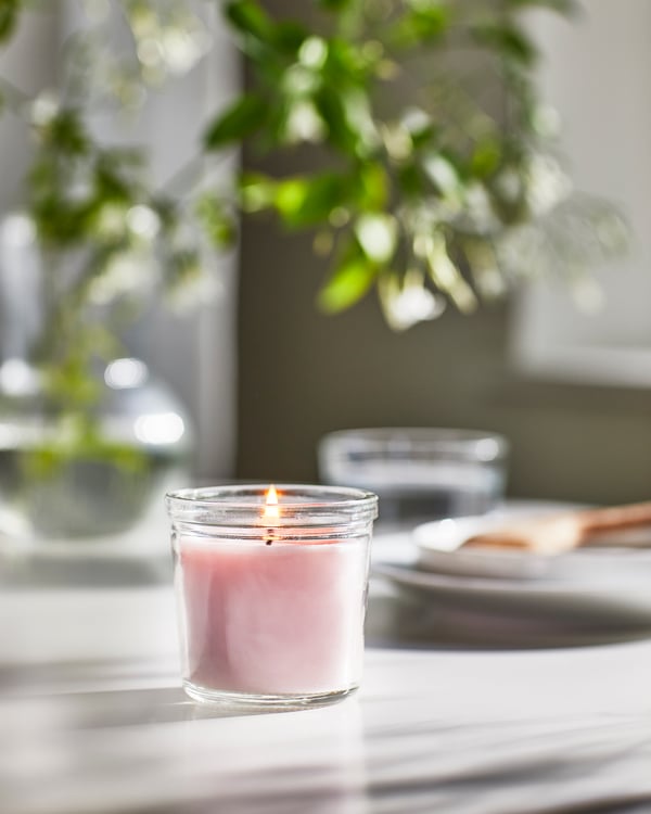 A Jasmine/pink LUGNARE scented candle in glass