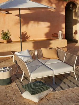 A white/beige SEGERÖN coffee table, outdoor