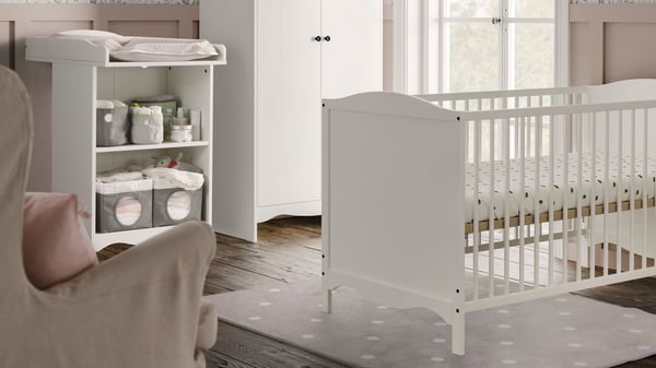A white SMÅGÖRA 3-piece baby furniture set in the childrens room