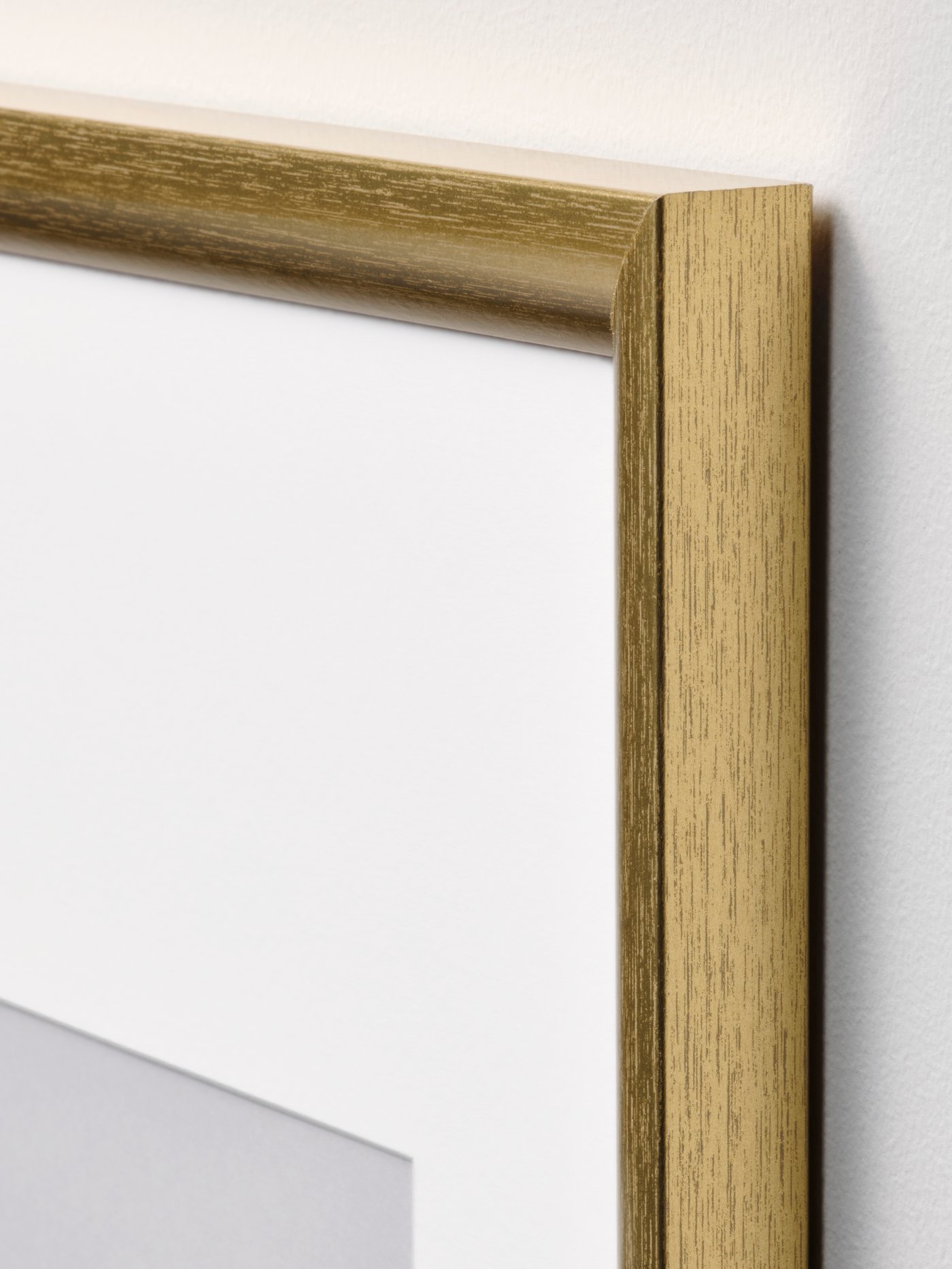 A gold-colour SILVERHÖJDEN frame