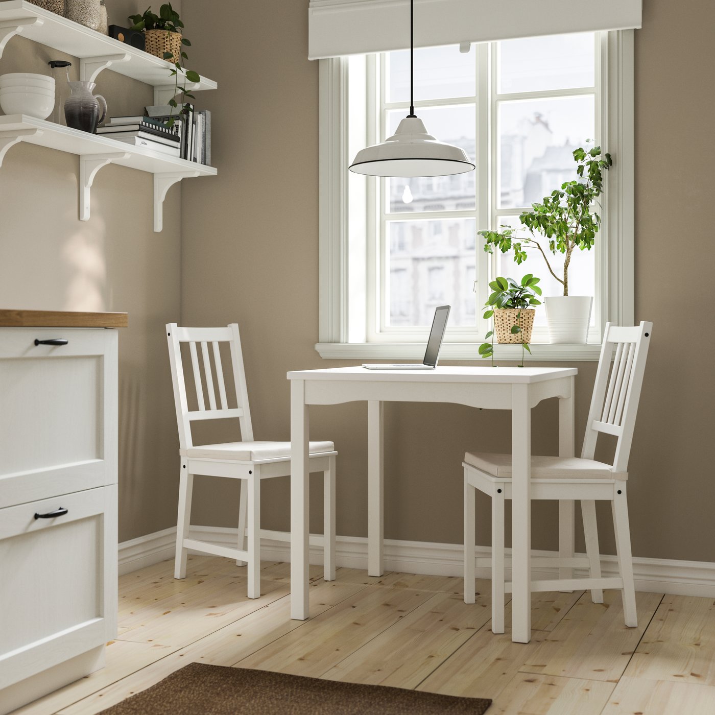 A white/white STEFAN table and 2 chairs
