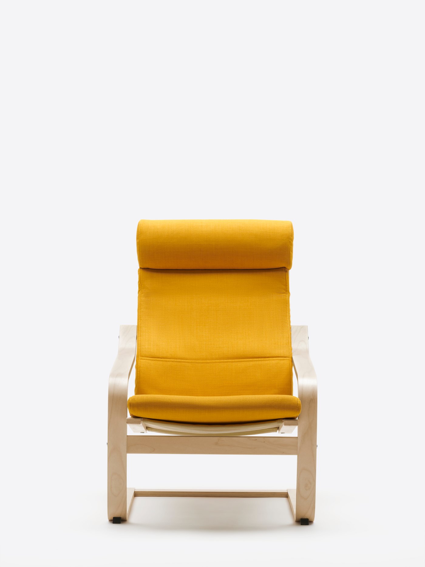 A birch veneer/Skiftebo yellow POÄNG armchair in the NA