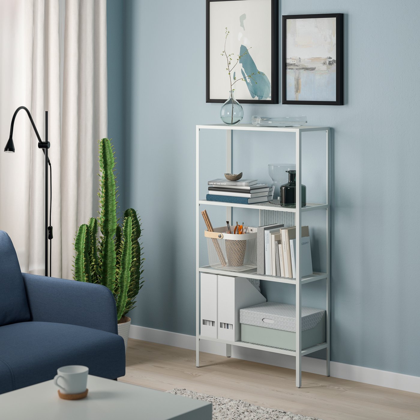 A metal/white BAGGEBO shelving unit