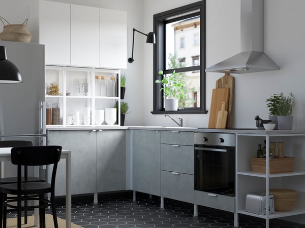 A bright kitchen with grey ENHET cabinets.