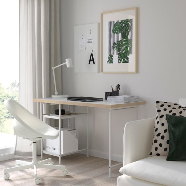 A white MALSKÄR swivel chair