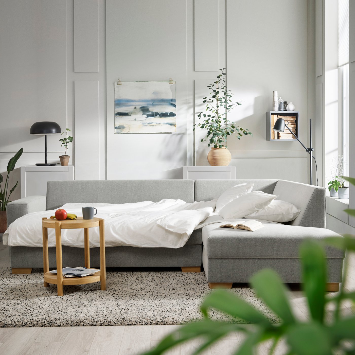 A with open end, right/Tallmyra black/white SÖRVALLEN corner sofa-bed, 3-seat in the living room.