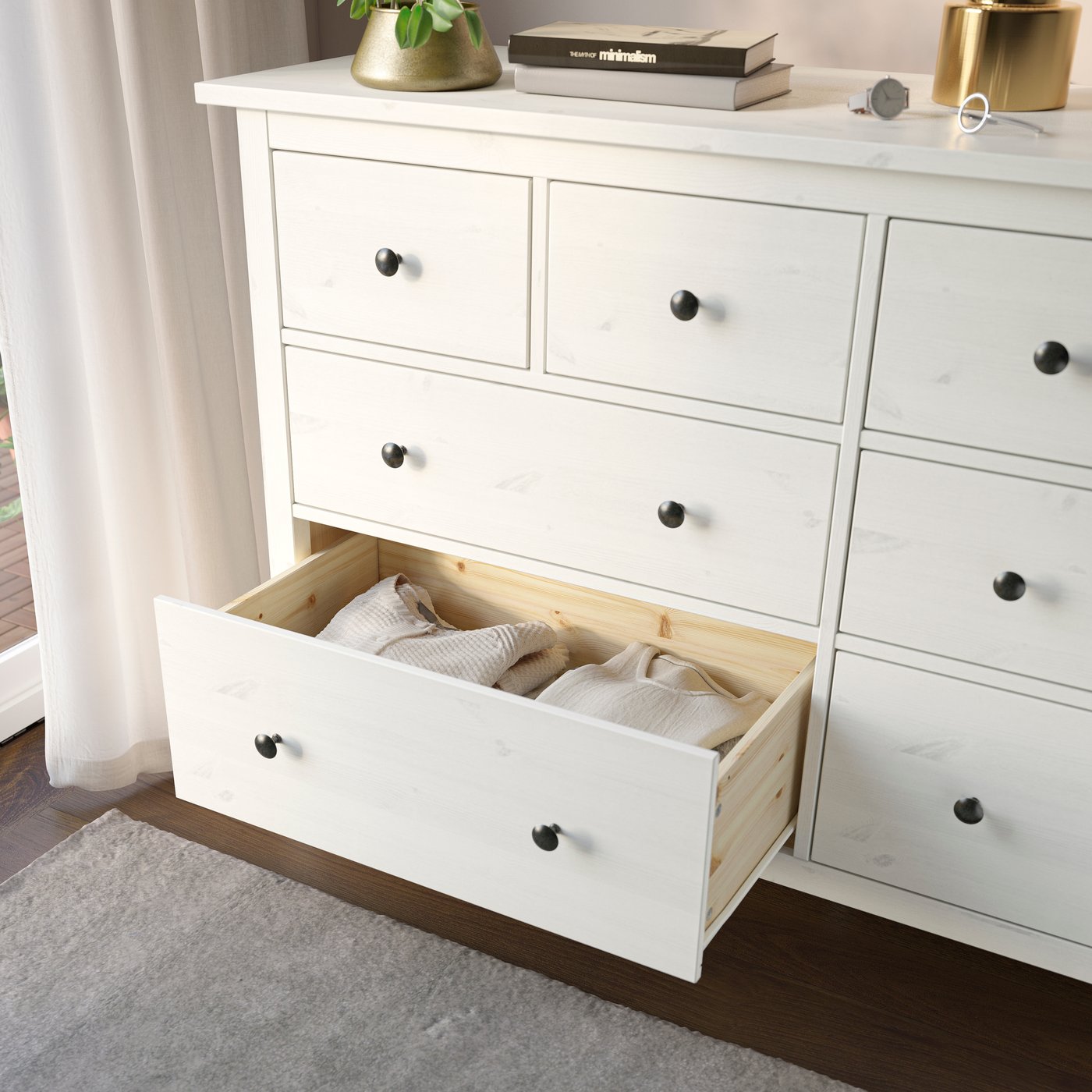 A white stain HEMNES chest of 8 drawers