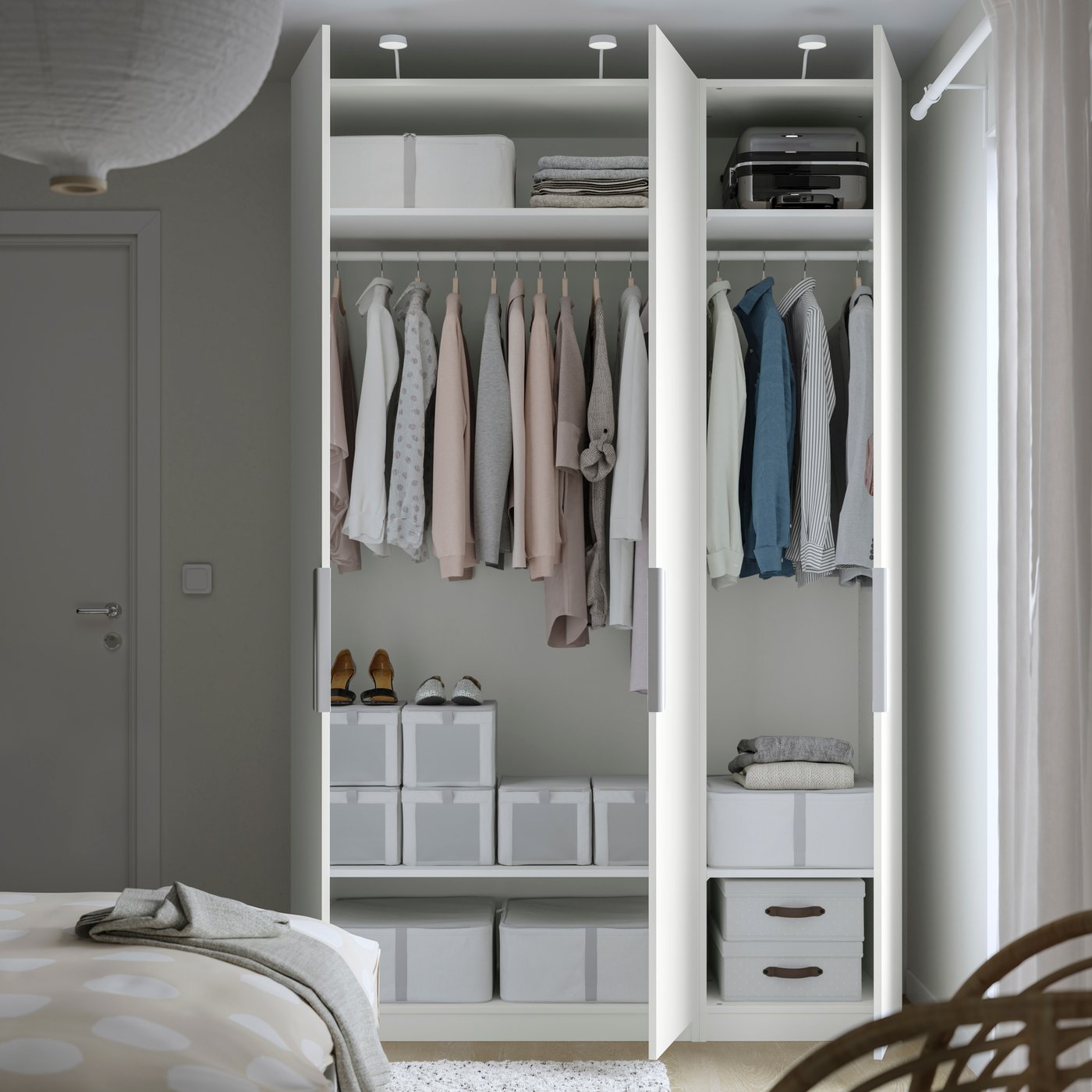 A white/white PAX wardrobe in the bedroom
