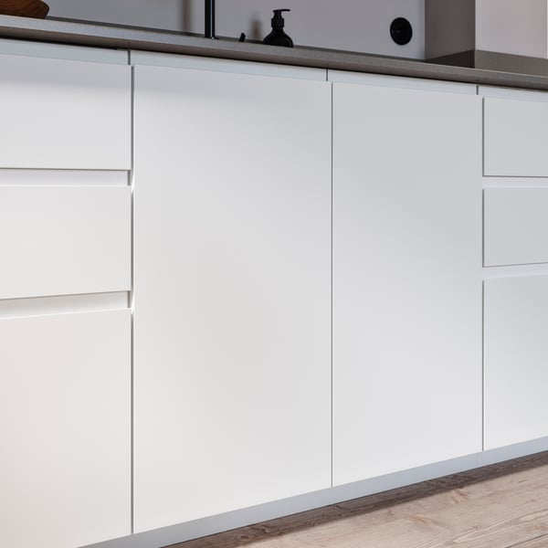 A matt white VOXTORP door