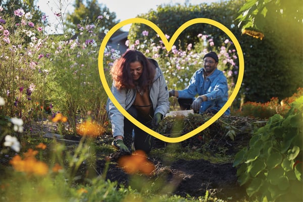 A man and woman gardening.