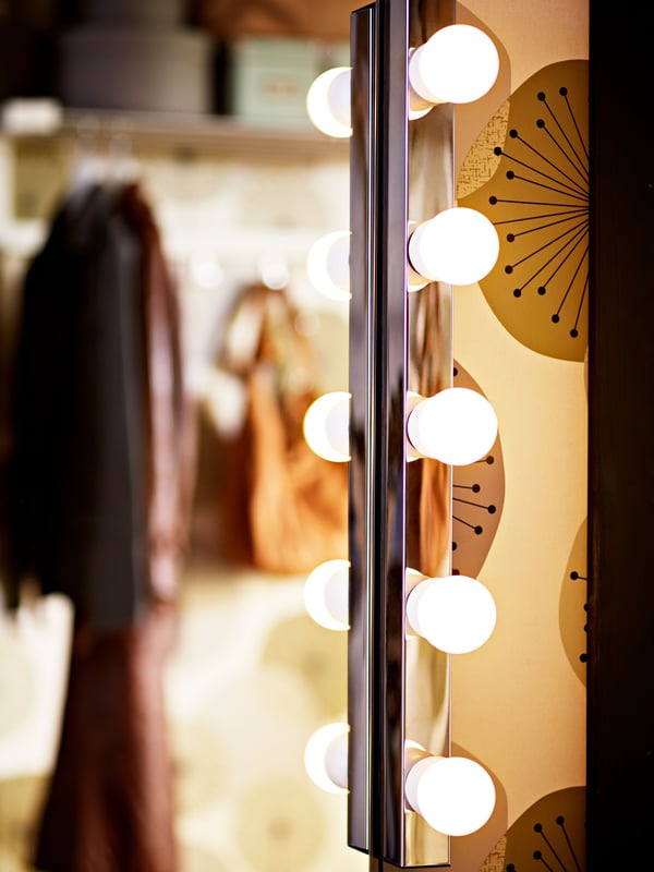 A chrome-plated MUSIK wall lamp