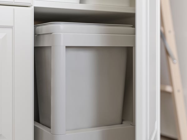 A light grey HAVSTORP drawer front