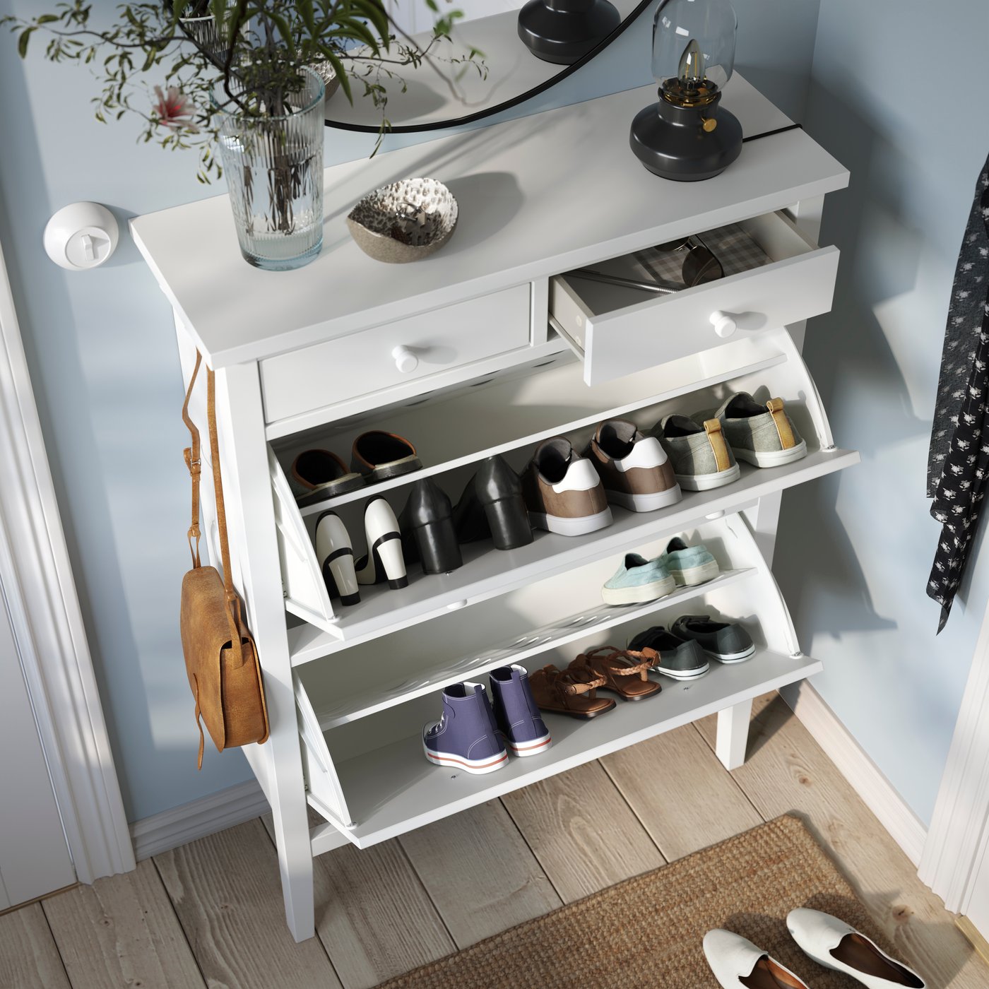 A white GULLABERG shoe cabinet with 2 compartments