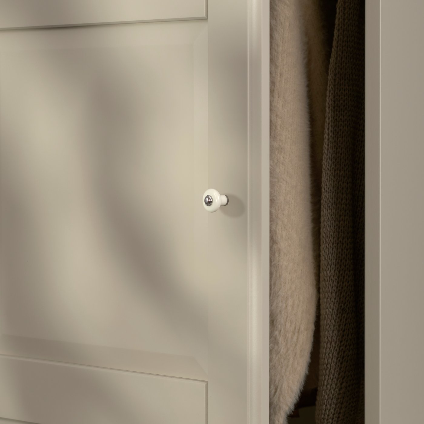 A beige PAX wardrobe door