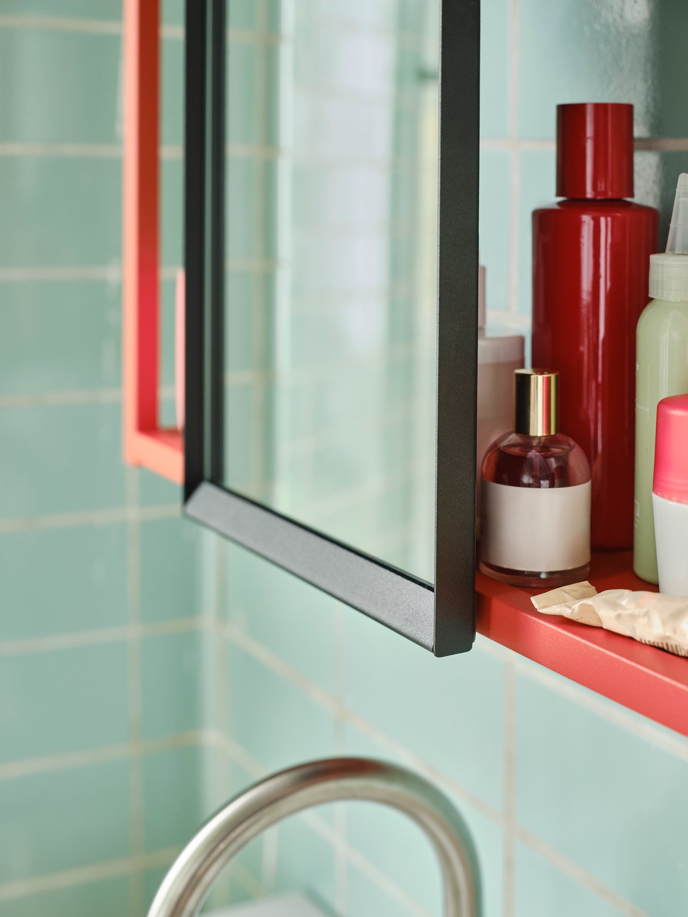 An anthracite ENHET hanging mirror f frame in the bathroom