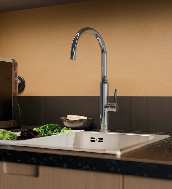 A grey GRUNDVATTNET colander in the kitchen