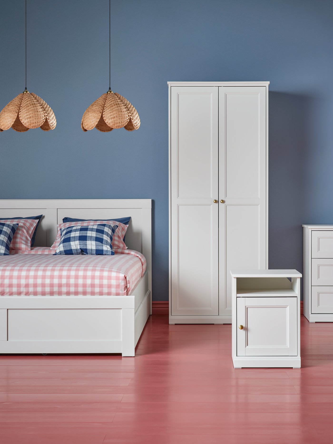 FÅGELFJÄLLET bed frame, bedside table, wardrobe and chest of drawers arranged in a still-life style in a studio setting.