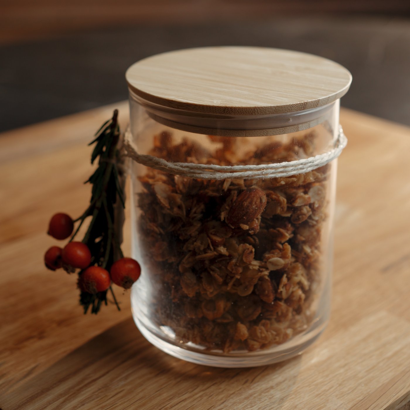 A clear glass/bamboo EKLATANT jar with lid