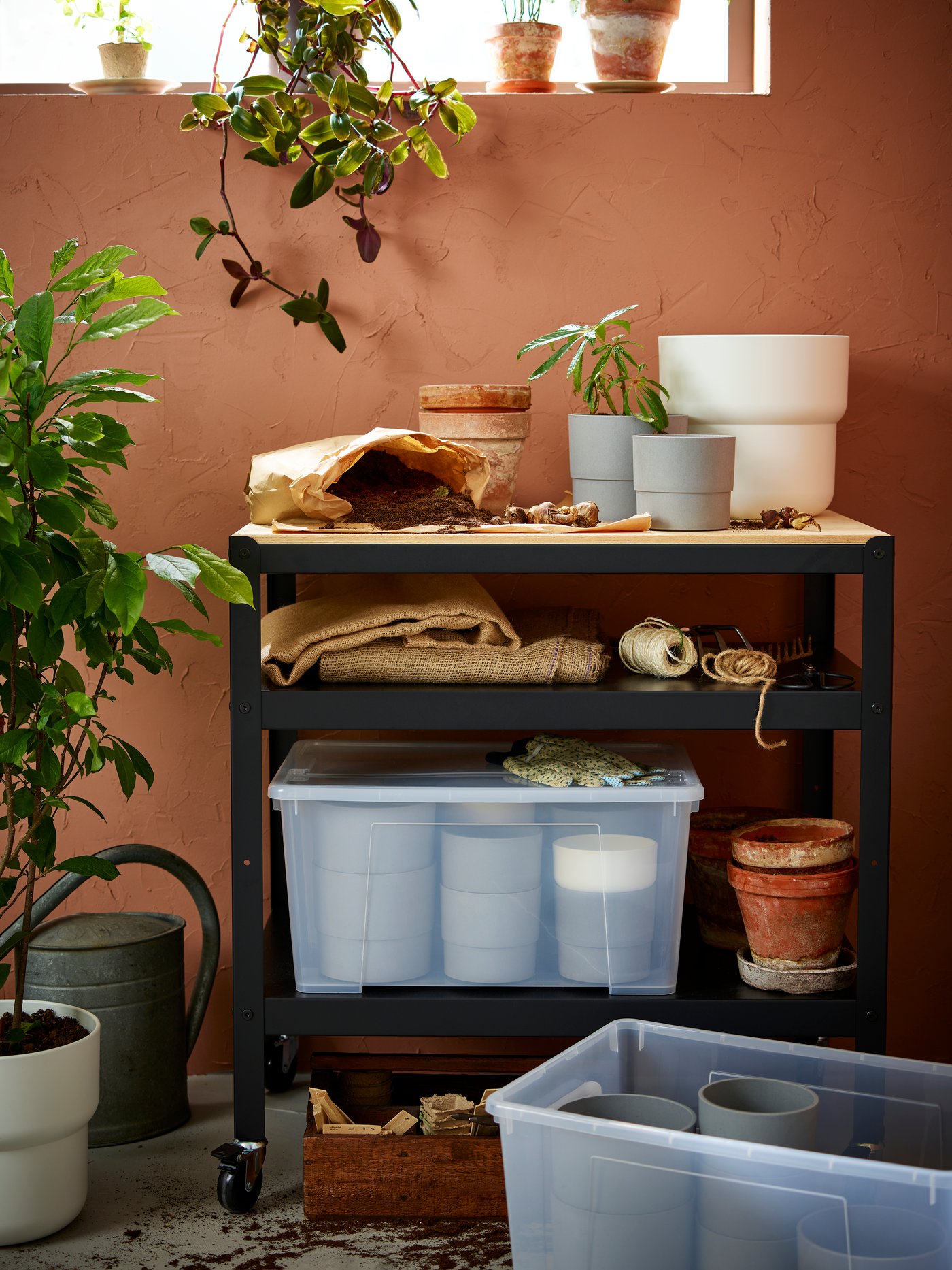 An in/outdoor white FÖRENLIG plant pot outside