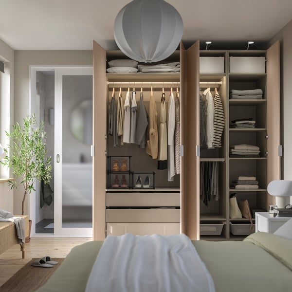 A grey-beige/high-gloss light orange FARDAL wardrobe combination