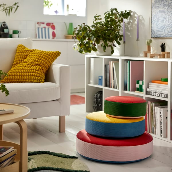 A stackable/multicolour GREJSIMOJS floor cushion
