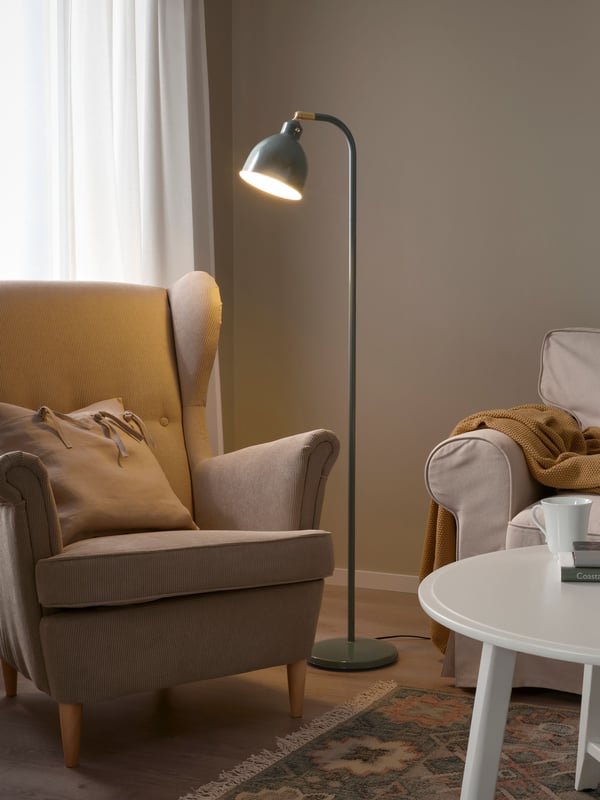 A grey-green RÖDFLIK floor/reading lamp
